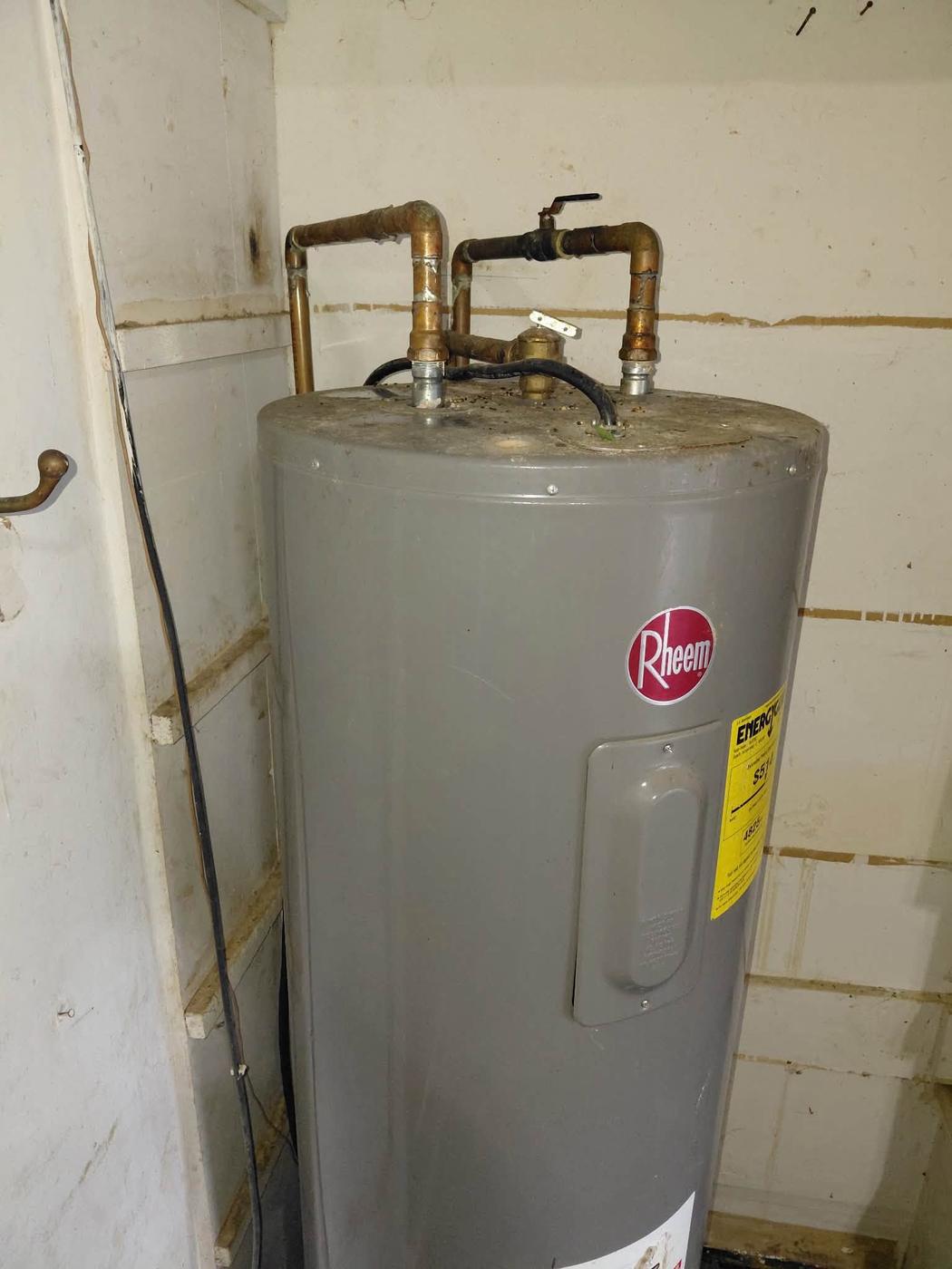 An installed Rheem electric water heater